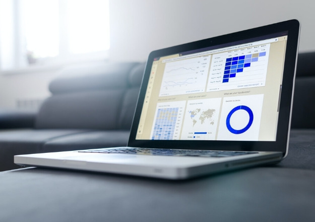 Tilt angle of a laptop displaying graphs | Do Likes and Followers Equal Sales?