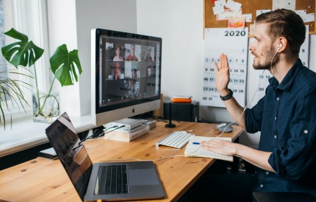 Young man having Zoom video conferencing call via computer | Build an Excellent Sales Culture