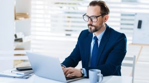 a business man woking on computer in the office