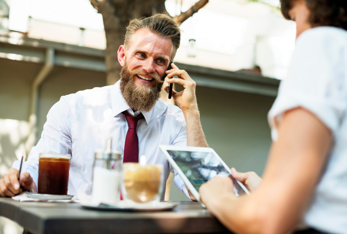 Bearded man answering a call | Cold Calling is NOT Dead: How We Built 1.1M in Pipeline Using the Phone | Cold Calling is Dead