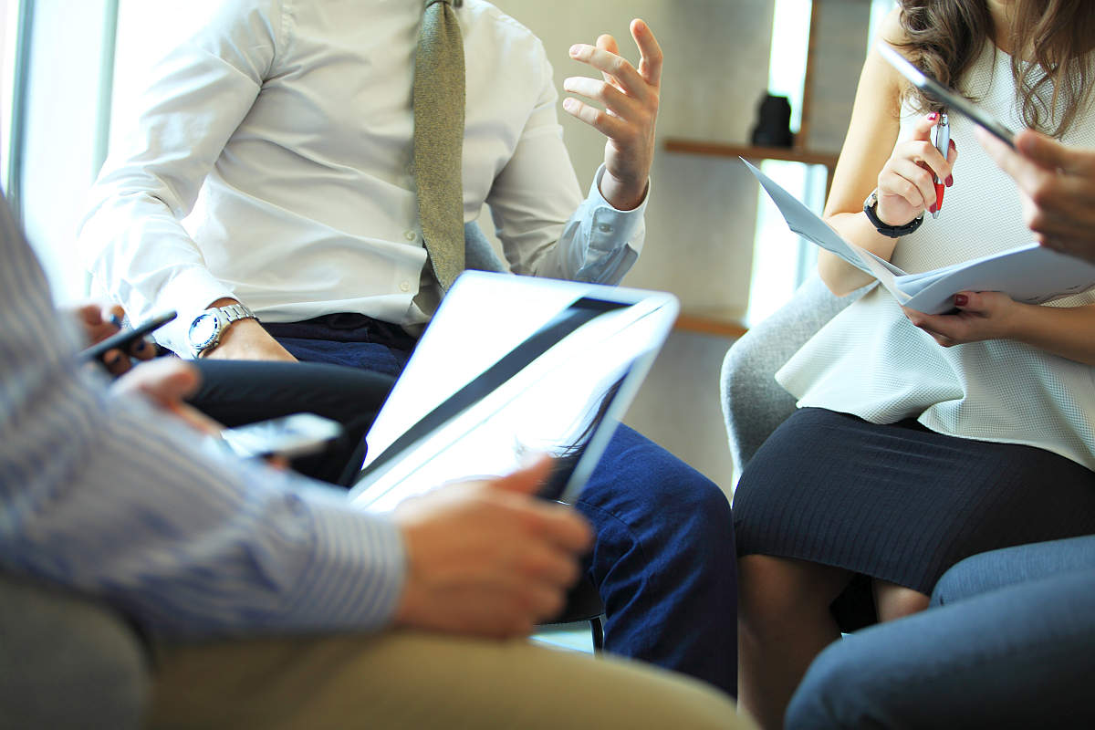 Business conference closeup young people sitting | Tips For More Effective Sales Meetings | sales meeting