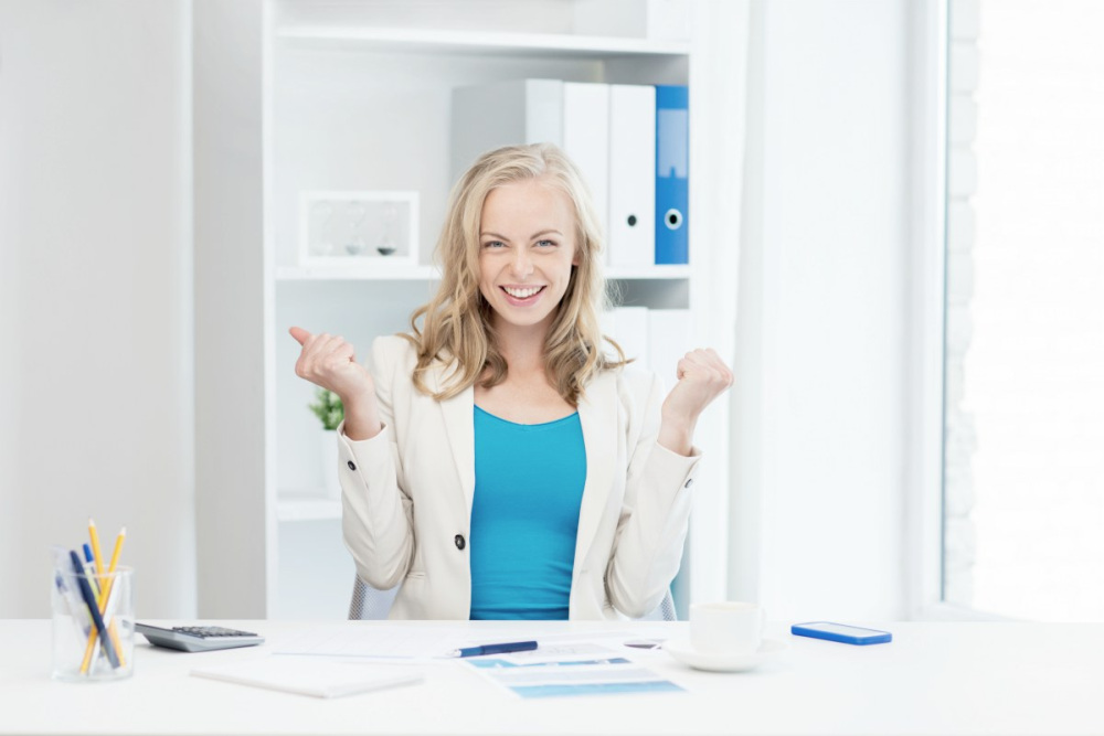 Happy successful businesswoman smiling | Salesperson Skills Of Top Performers [INFOGRAPHIC] | salesman | inside sales job description | skills for sale | sales skills