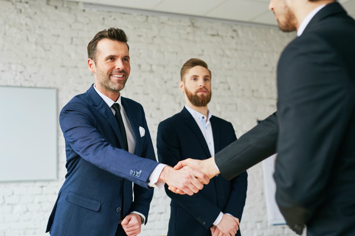 Salesperson shaking hands with the prospect | Remember The R.O.I. | Steps to Build Trust in 3 Minutes