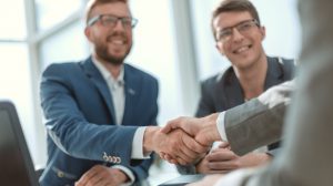 Successful business people shaking hands