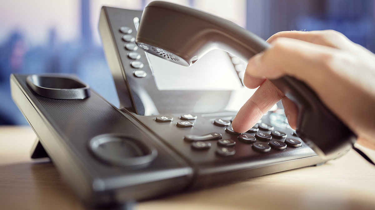 telephone dialing making a call | The Seven Rules of Cold Calling | Best of 2018 on The Sales Insider