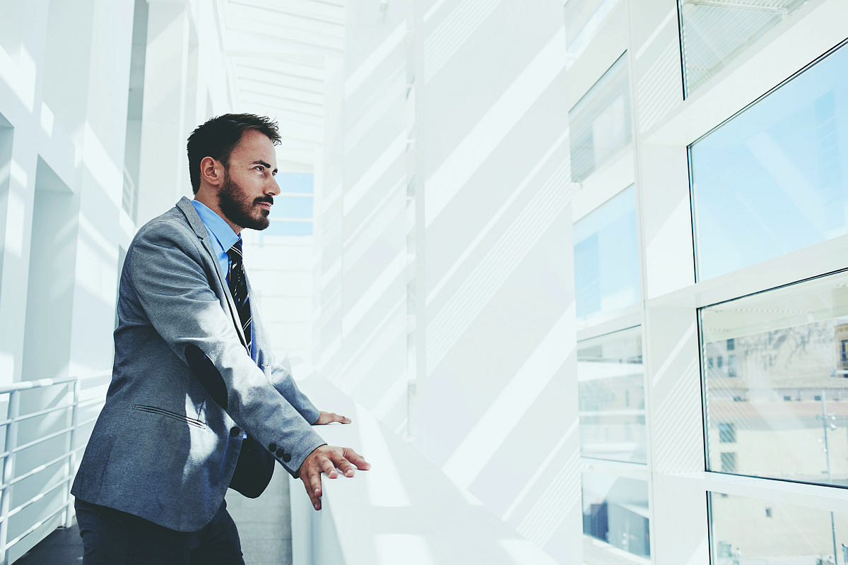 Portrait young successful businessman thinking about | Three Steps For Breaking Through The Fear And Doing The Hard Things | overcoming fear