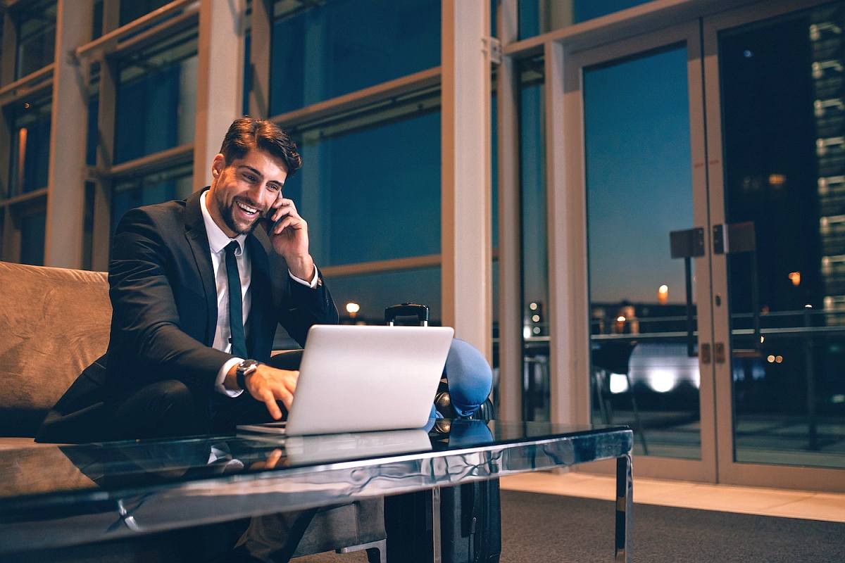 Handsome man at waiting room in airport terminal | Stop Pitching: Start Solving Problems For Your Customers