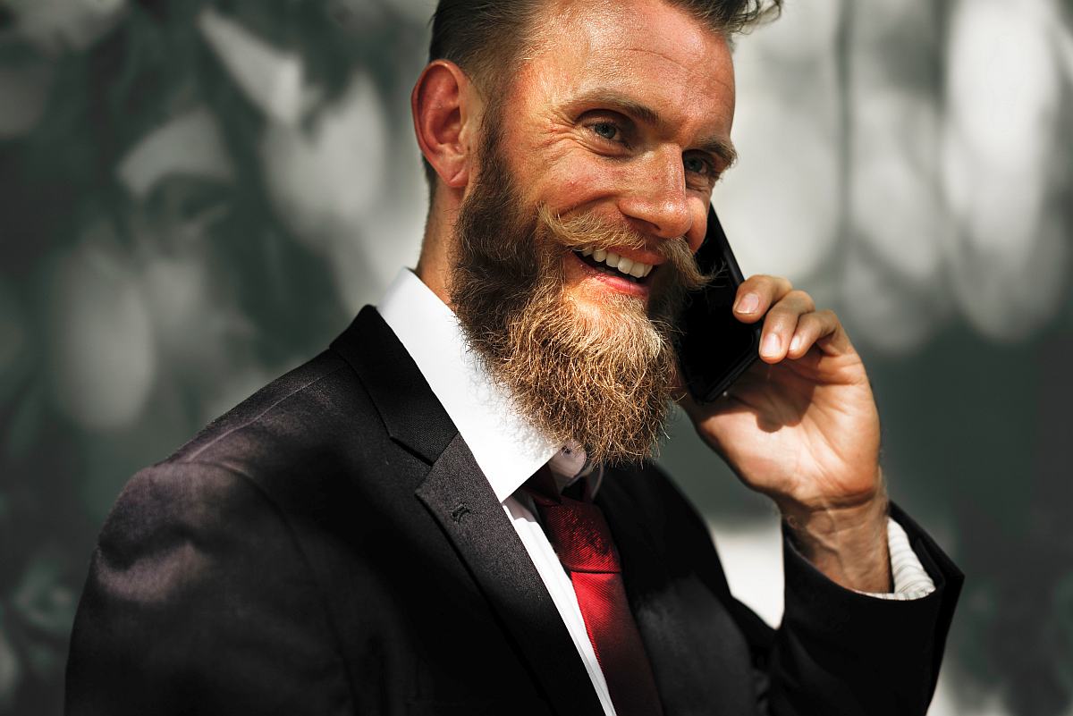 Bearded man making a call | How Salesforce Does Sales Development
