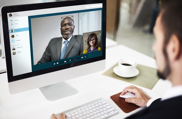 Video call between a white bearded man a woman with glasses and a black middle aged man | communicate videocall