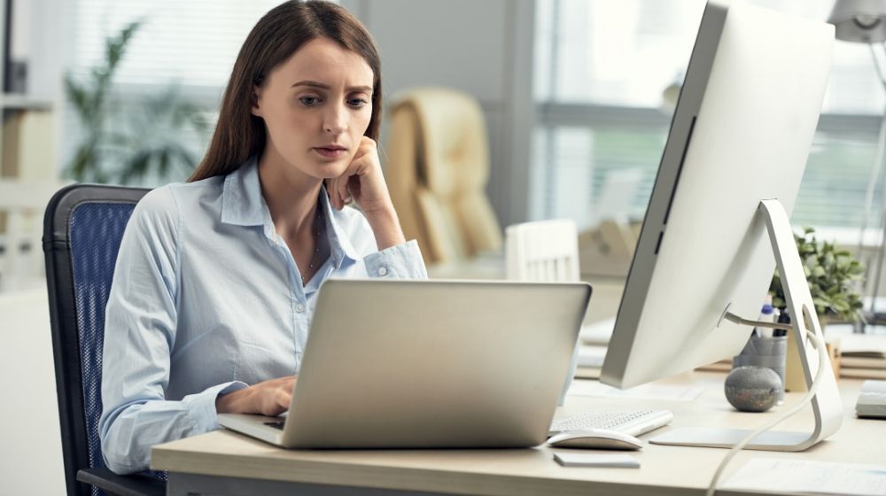 woman working on computers in the office
