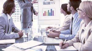 Young business people in board room meeting at the office